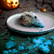 Mouldy halloween cake sitting on a plate